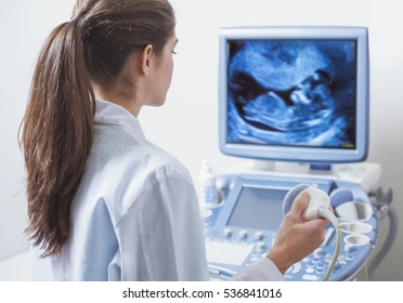 young-woman-doctor-viewing-ultrasound-260nw-536841016